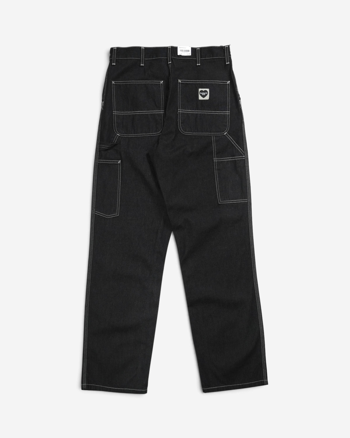 Чорні джинси Carhartt WIP Single Knee Pant, вигляд ззаду, з великими кишенями, контрастною білою строчкою, петлею для інструментів та нашивкою у формі чорного серця.