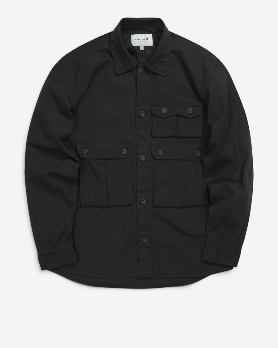Чорна бавовняна сорочка Carhartt WIP Tracker Shirt з відкладним коміром, застібкою на ґудзиках та чотирма оригінальними накладними кишенями попереду.
