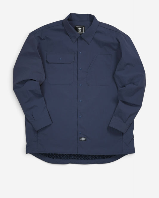 Чоловіча легка сорочка-жакет Dickies темно-синього кольору вільного крою з довгим рукавом, відкладним коміром, кнопками та асиметричними нагрудними кишенями.