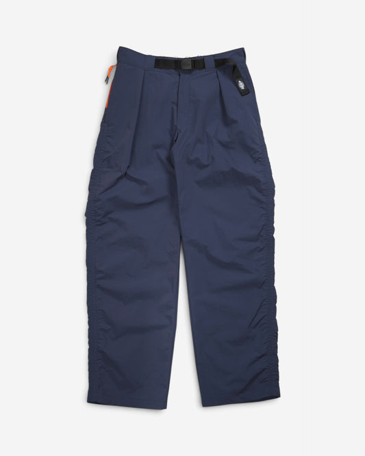 Темно-сині широкі брюки Dickies x Tokyo Design Collective Oversized Fit 874 Pants з еластичним поясом, ременем та білим круглим люверсом по центру.