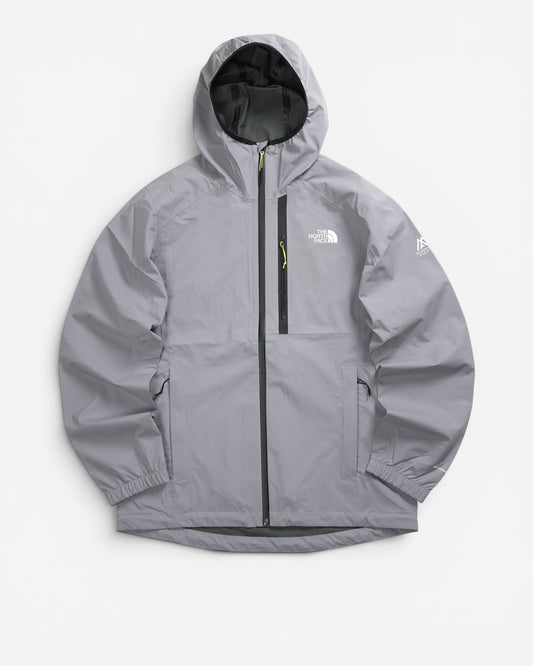 Світло-сіра спортивна куртка з капюшоном The North Face з контрастними чорними блискавками, білим принтом-логотипом та емблемою на рукаві.