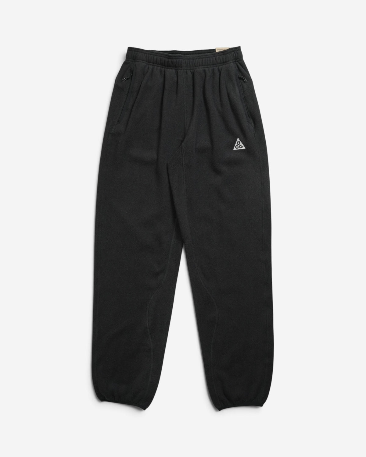 Жіночі чорні флісові штани Nike ACG Wolf Tree з вишитим білим логотипом на стегні та кишенями на блискавках.
